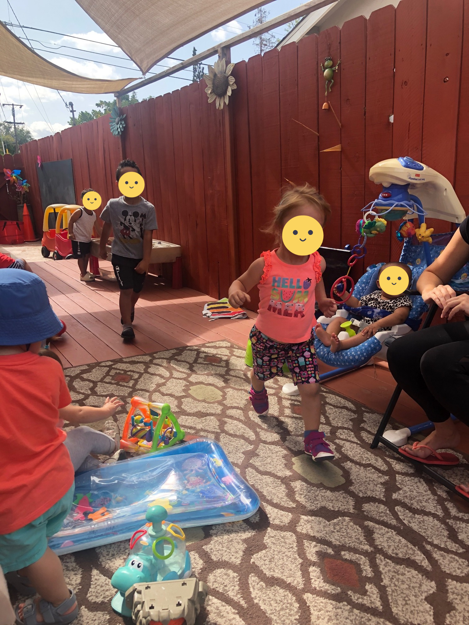 Children doing parallel play outsite on a cloudy day.